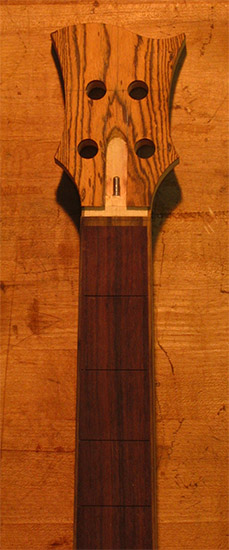 Bocote veneer on a Xylem bass headstock