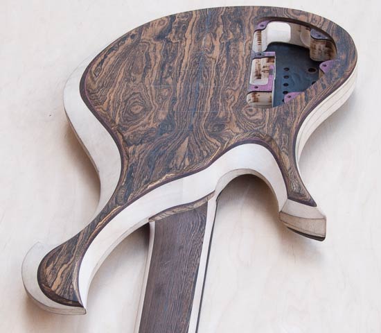 Custom bass w/ carved cutaway for high fret access