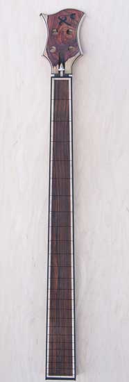 Custom bass neck with cocobolo fretboard, maple, ebony borders