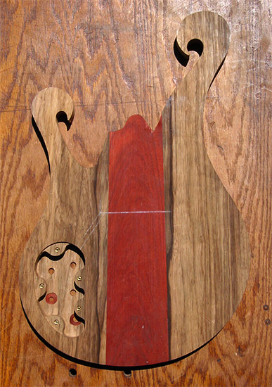 6 string bass body with limba core, bloodwood accent, back