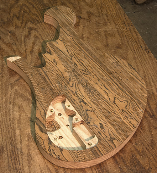 Custom bass body made of ash and bocote