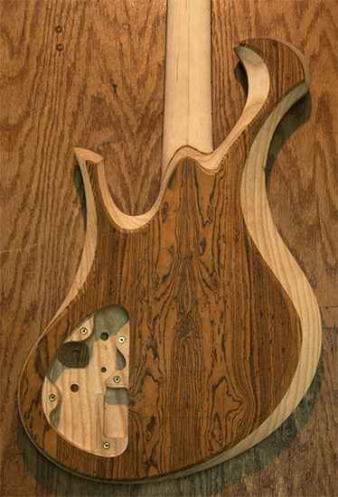 Bocote and ash bass guitar with Aguilar preamp routes
