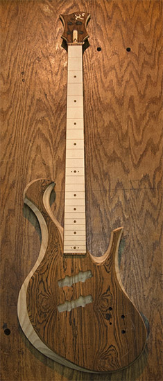 Ash custom bass guitar with Aguilar pickup routes