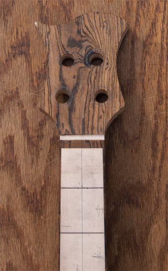 Bocote headstock on a short scale bass neck