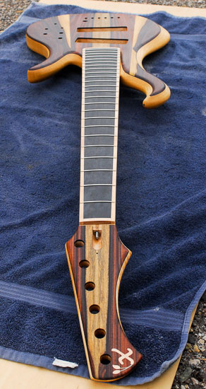 Reverse-inline headstock on a 6-string bass guitar