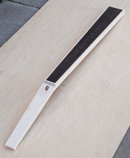 Bass neck in the building process, before headstock ears get glued to neck core