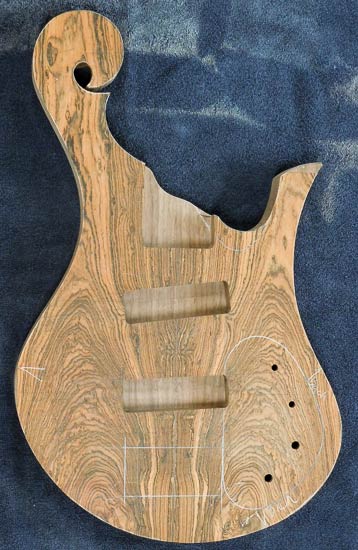 Custom bass body with bocote tops, angled pickup pockets
