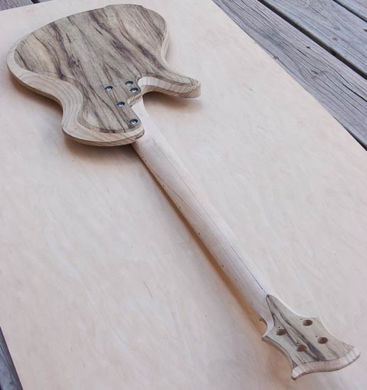Whale-back custom bass w/ maple neck, limba/ash body