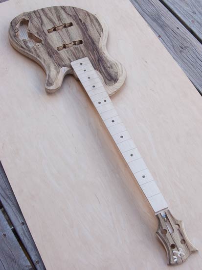 Single-cut bass with maple neck, ash body