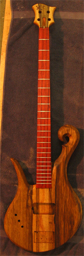 Left-handed 4 string Xylem bass with black limba body