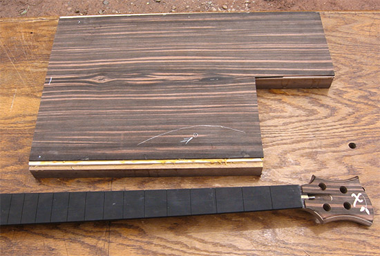 Black walnut four-string bass body, and neck with ebony fretboard