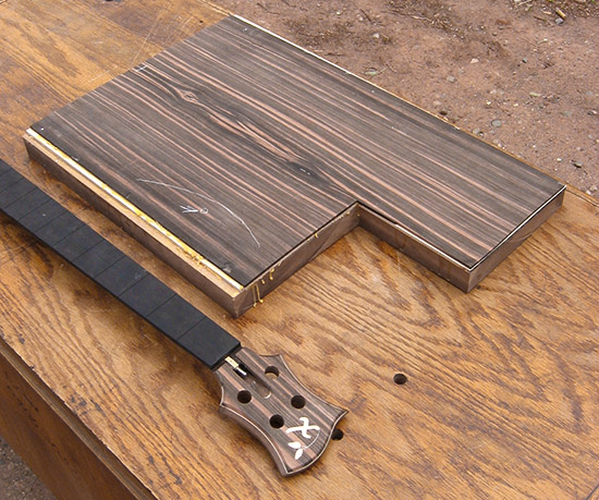 Custom bass neck and body with macassar ebony tops