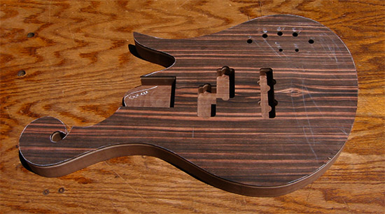 Macassar ebony scroll on a custom bass