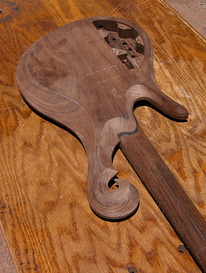 Custom bass neck heel with panga panga neck, walnut body; back