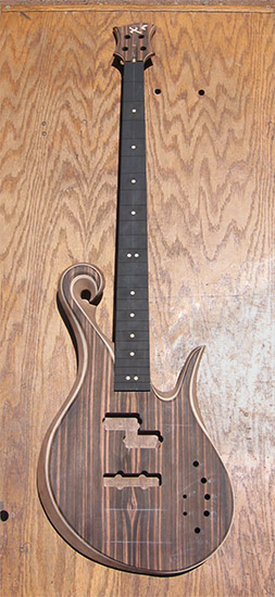 Macassar ebony top and ebony fretboard on a custom bass