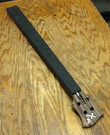 Custom bass neck with ebony fretboard and panga panga neck