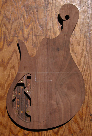 Black walnut bass body with exotic body shape