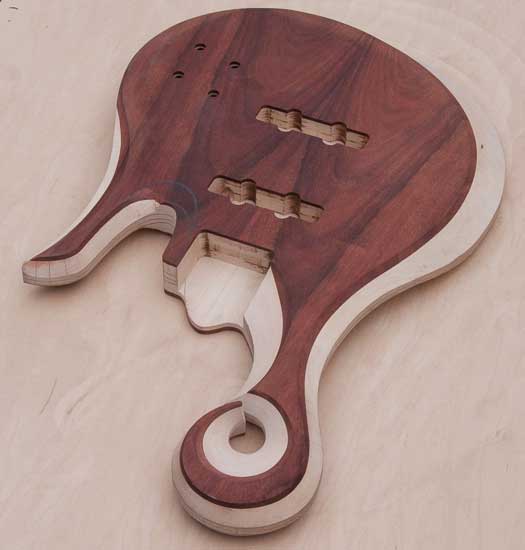 Maple/bloodwood custom bass guitar body, hook scroll