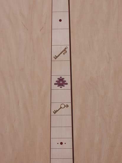 Bass neck with custom inlay, bocote and purpleheart