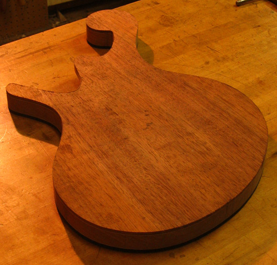 Black walnut top with maple accent on a 5 string bass