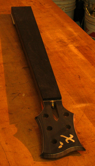 Ebony fretboard and headstock on a custom bass neck