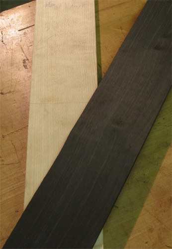 Quarter sawn ebony fretboard and maple neck of a 6 string bass