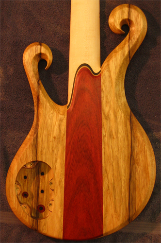 Custom bass body with double scrolls from the back