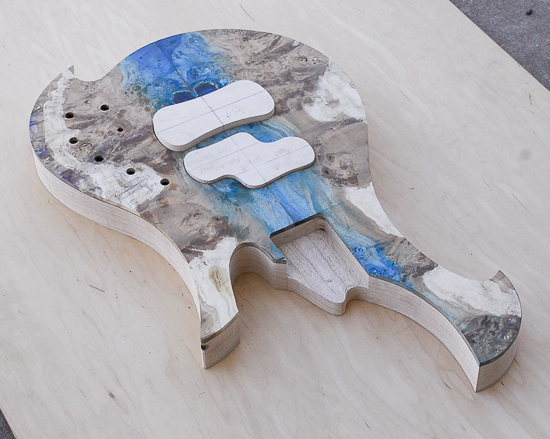 Xylem custom bass body with rounded maple pickup covers