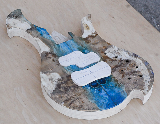 Blue and brown resin-stabilized topwood on a Xylem bass