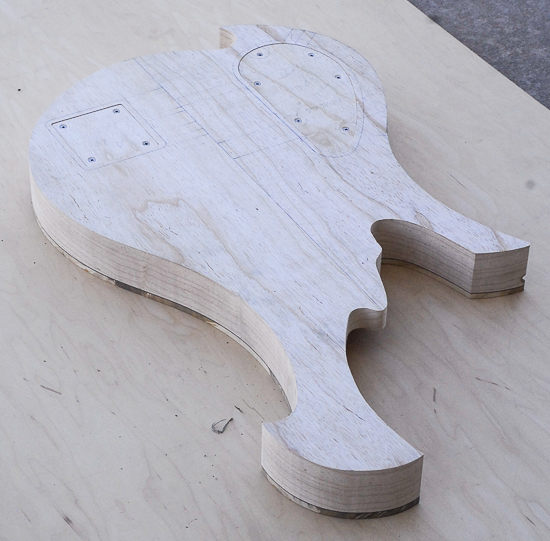 Xylem-style scroll on a swamp ash bass body