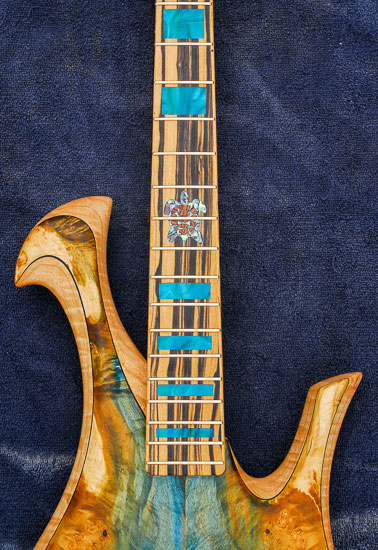 Sea turtle and green block inlays on a bass guitar build