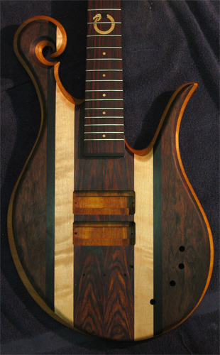 Custom bass with striped top wood and mahogany core