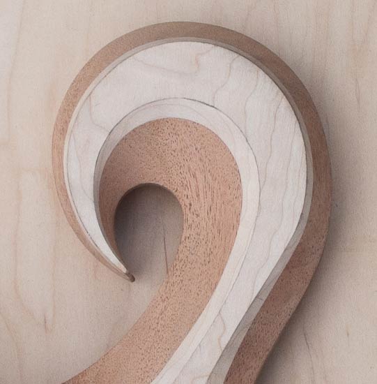 Custom bass body, flamed maple top, mahogany core