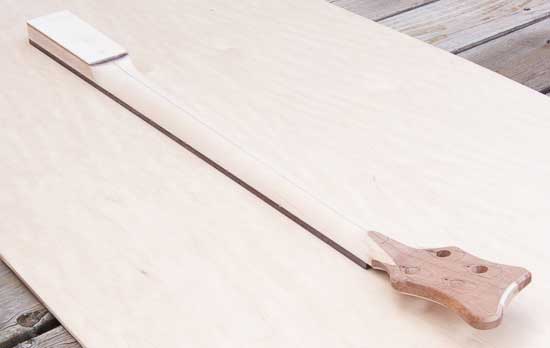 Carved maple/rosewood neck with mahogany headstock