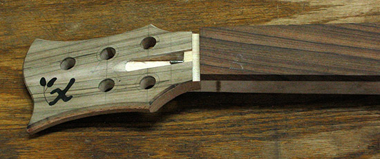 Fretless 5 string bass neck with spalted maple headstock