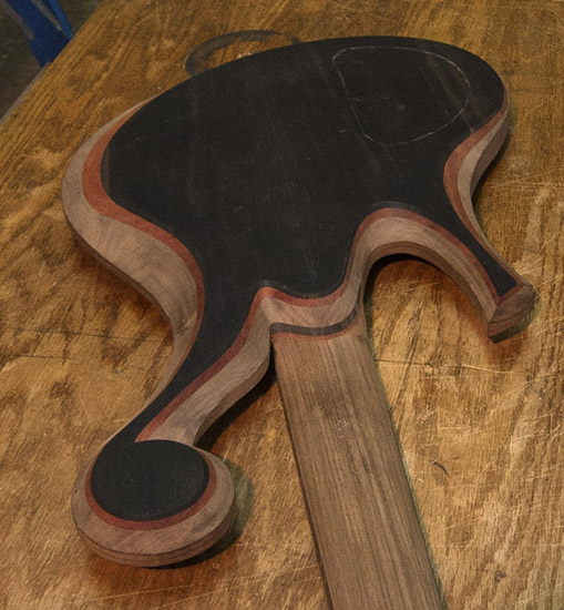 Ebony custom bass with ball scroll, bloodwood accents