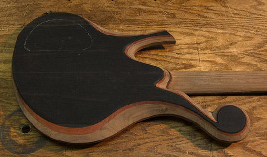 Ebony and bloodwood tops on a walnut custom bass