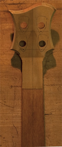 Poplar veneer on a 4 string bass' headstock