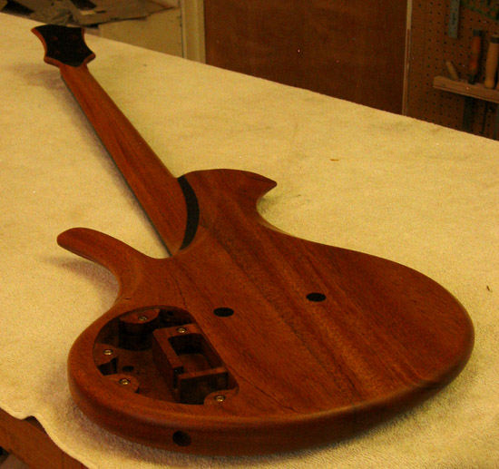 Single cutaway neck heel on a mahogany custom bass