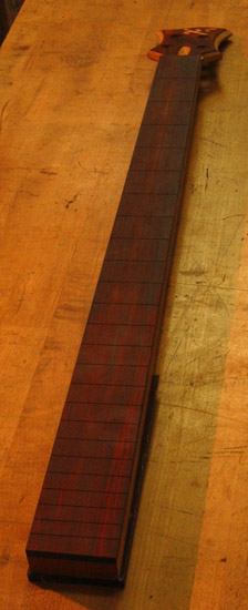 Bois de Rose fretboard on a bass neck