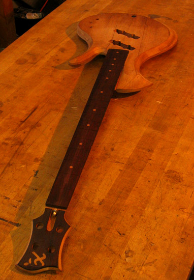 Bois de rose headstock on a 4 string bass