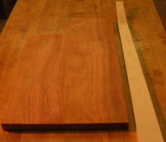Back of a bass' mahogany body blank and maple neck blank