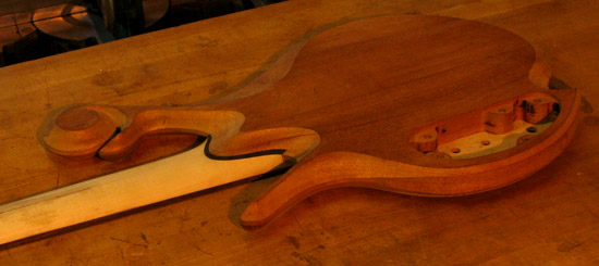 Neck joint of a custom bass with ebony shim