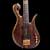 Front of the custom bass' body with macassar ebony top, black limba core and gold Hipshot bridge 