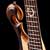 Xylem bass guitar's scroll and Uroboros inlay