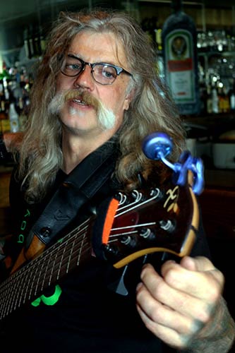Dae Meidinger tuning his Xylem 7-string at the LoDo Bass Bash 2016
