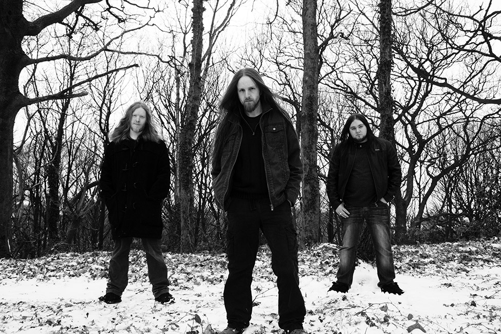 Winterfire's band members in a snowy landscape
