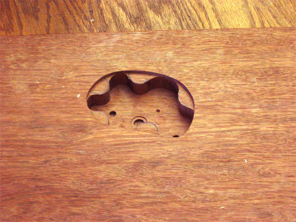 The custom guitar's control cavity ready to accept threaded inserts