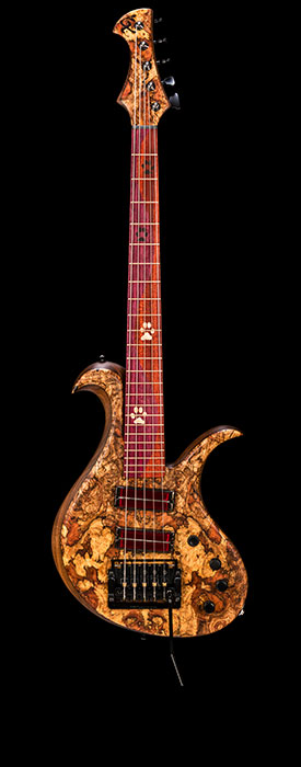 Custom bass with Q-Tuner pickups, Kahler tremolo, burl tops