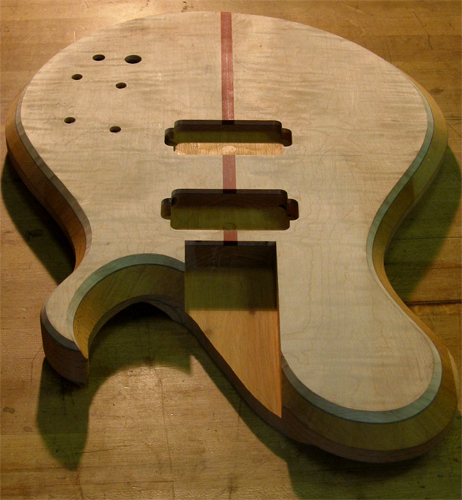 Carved Xylem guitar body with mahogany core & figured maple top